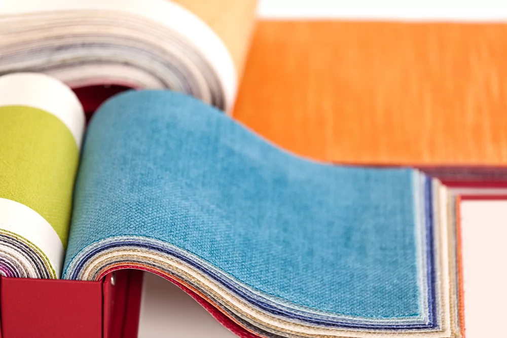 Fabric Hanged Neatly Using Swatch Books